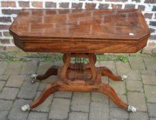 Georgian fold over card table with lyre