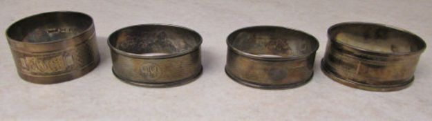 4 silver napkin rings total weight 1.99