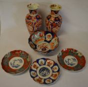 Pair of Japanese Imari vases (with resto