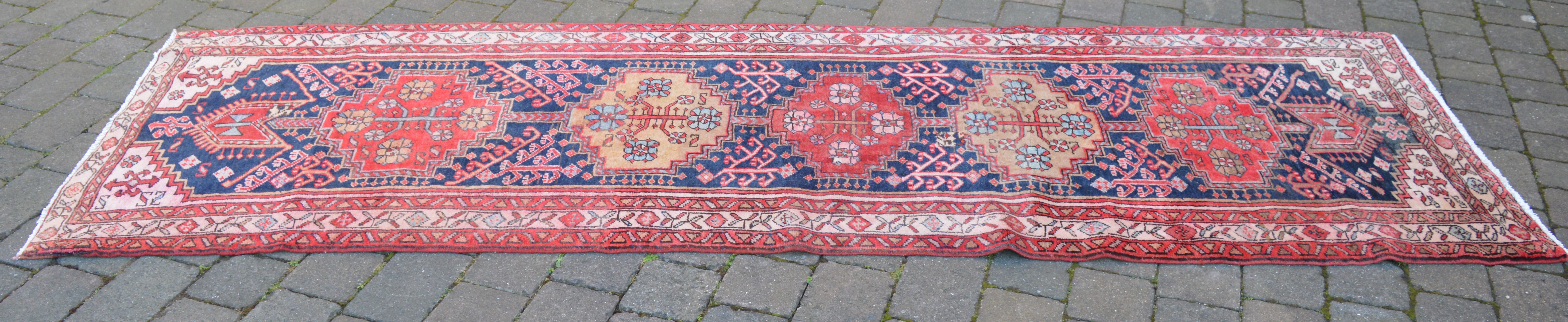 Large Persian runner with a multi colour