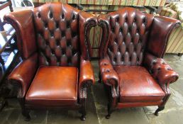 2 Leather wing back arm chairs