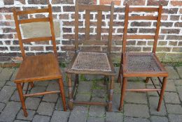 2 cane seated chairs and one other chair