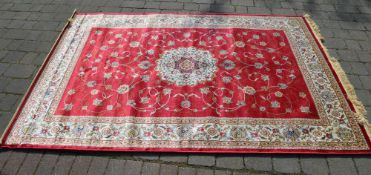 Red ground Kashmir rug with a medallion