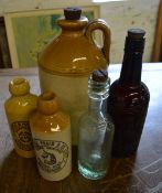 Various glass and stoneware bottles inc