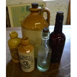 Various glass and stoneware bottles inc