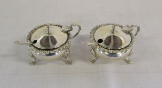 Pair of silver mustard pots with spoons