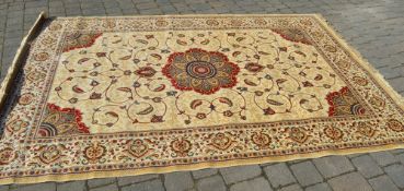 Gold ground Kashmir carpet with a medall