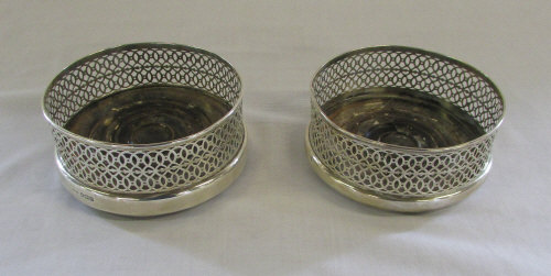 Pair of silver wine coasters London 1909