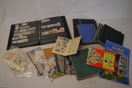 Box of various loose stamps, albums, sta