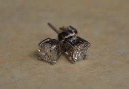 Pair of 18ct white gold diamond earrings