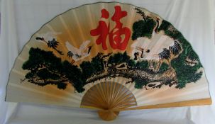 Large oriental style wall fan