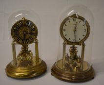 2 Anniversary clocks under glass domes