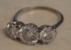 A beautiful 3 stone diamond ring, brilli