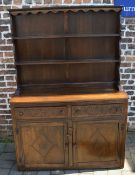 Oak dresser with carved panelling