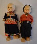 Pair of Dutch bisque head/hands dolls