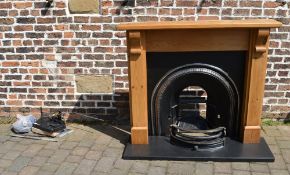 Cast iron fire with pine surround & gas