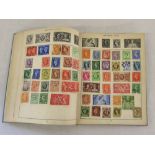 Stamp album containing world stamps