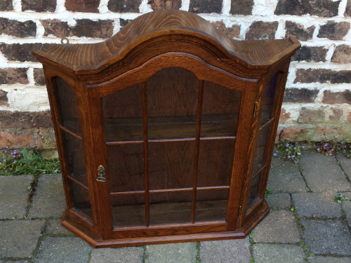 Small oak display cabinet