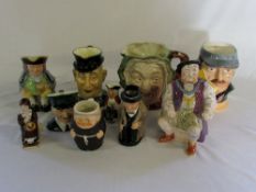 Selection of character/toby jugs inc Car