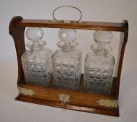 Late Victorian Tantalus with 3 decanters