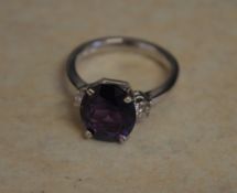 18ct gold diamond & purple spinel ring,