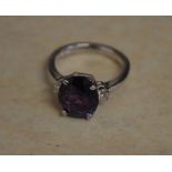 18ct gold diamond & purple spinel ring,