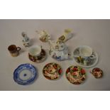 Various miniature teacups & saucers incl