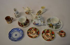 Various miniature teacups & saucers incl