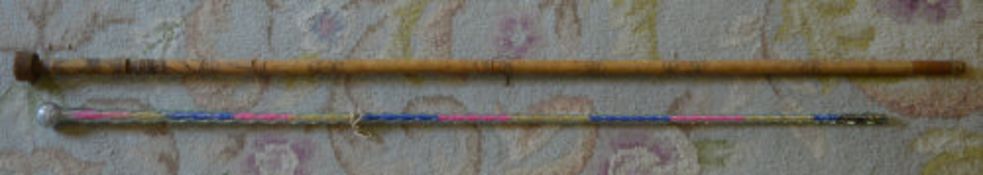 Glass cane containing coloured glass bea