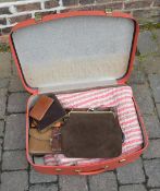 Case including various purses/handbags