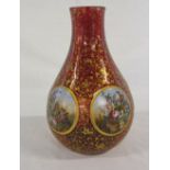 Ruby glass vase with floral decorations