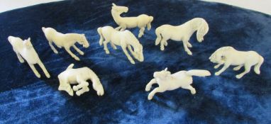 Collection of 8 miniature carved bone ho