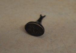 Possibly silver/white metal seal stamp w
