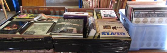 Large quantity of Elvis books and LP 33