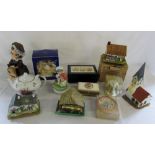 Assorted musical cottages, dolls, teapot