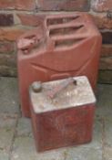 Shell petrol can and a red jerry can