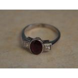 Tested as 18ct white gold ruby & diamond