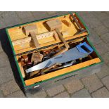 Wooden toolbox with various hand tools
