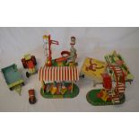 Various wind up toys including a motor c