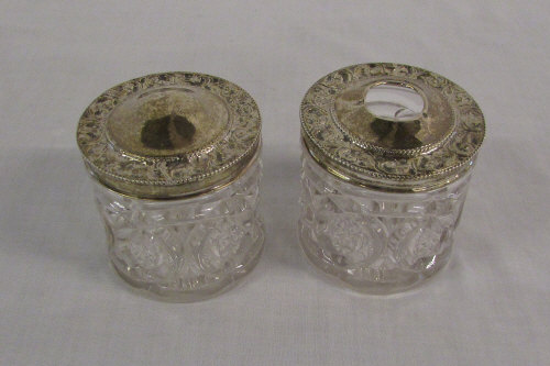 2 silver topped dressing table glass jar