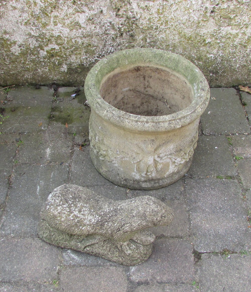 Concrete plant pot and otter