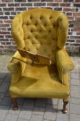 Upholstered wing back reading chair with