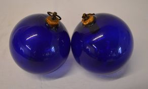 2 blue glass baubles