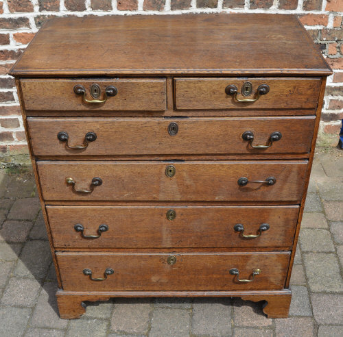 Georgian oak chest of drawers with brass