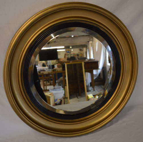 Round gilt framed wall mirror with bevel