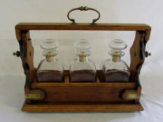 Three decanter tantalus