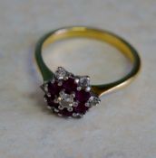 Tested as 18ct gold ruby and diamond rin