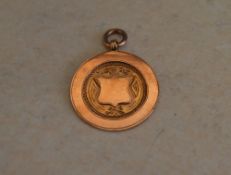 9ct rose gold medallion with engraving t