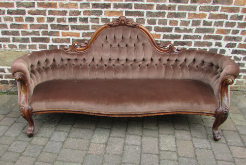 Large Victorian camel back sofa with scr