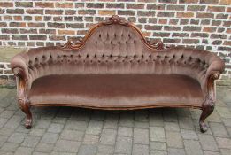 Large Victorian camel back sofa with scr